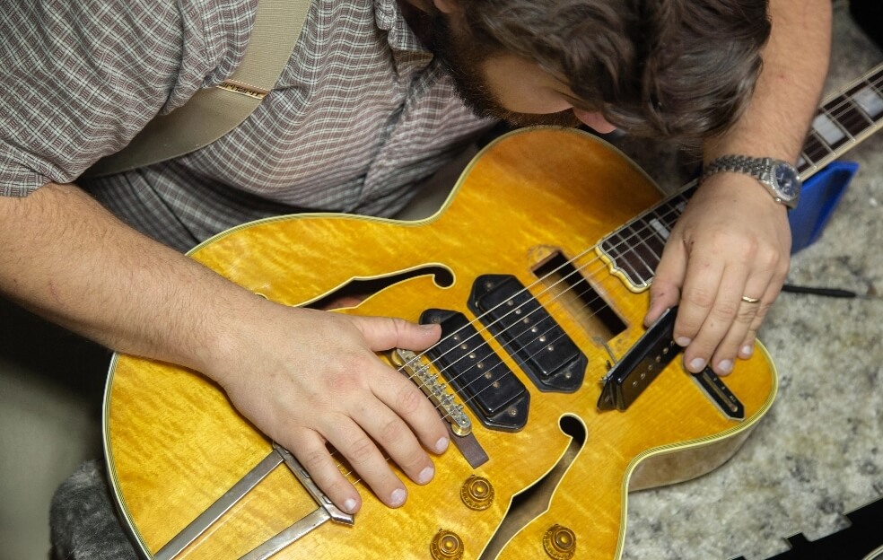 Joe Dampt Inspecting A Rare 1956 Gibson ES-5 With A Factory Error